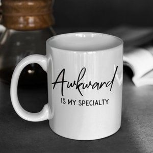 Awkward is my specialty coffee/tea cup (15 oz)